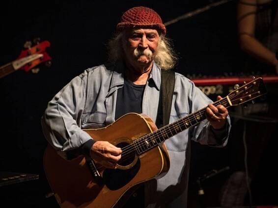 David Crosby performing onstage in 2018