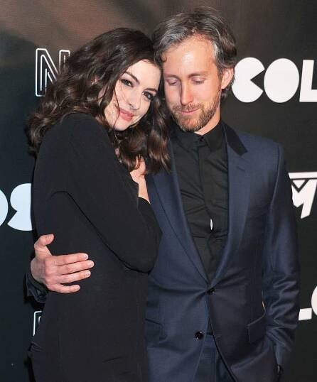 Anne Hathaway and husband Adam Shulman arrive at the premiere of Neon's Colossal at the Vista Theatre on April 4, 2017 in Los Angeles, California.