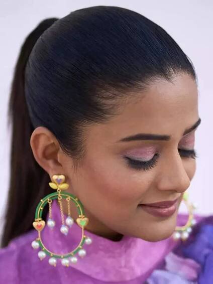 Priyamani shows how to style a saree with a burst of colors