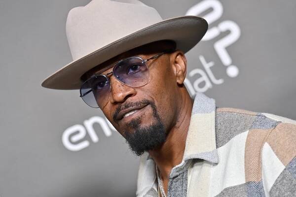 Jamie Foxx in a flannel shirt and fedora at the 2022 screening of "Below The Belt" at Directors Guild Of America in L.A.