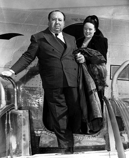 SABOTEUR, Alfred Hitchcock, and wife ALMA REVILLE arrive in New York to film scenes, 1942