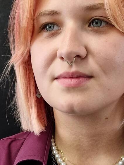 Triangl septum piercing