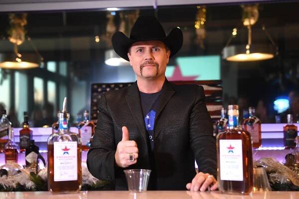 John Rich offers reward after being robbed