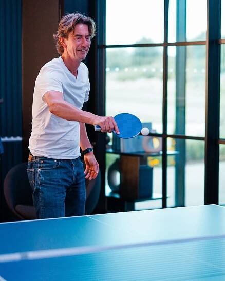 Thomas Frank, Tottenham's new head coach, playing table tennis.