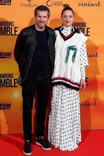 Actress Marion Cotillard and her husband and film director Guillaume Canet attend the "Nous finirons Ensemble" photocall premiere at UGC De Brouckere on April 23, 2019 in Brussels, Belgium.
