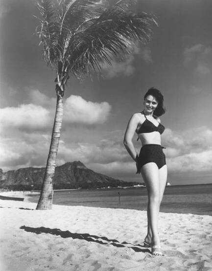 Donna Reed posing on a beach in Hawaii for the movie 'From Here to Eternity', 1953.