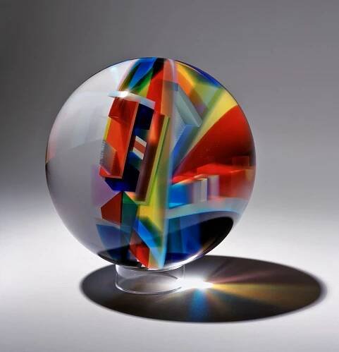  David Huchthausen (Ameircan, born 1951). S phere 3,  2010. Cut, laminated, and optically-polished glass sphere; 12 in. Courtesy of Huchthausen Studio. Photo by Lloyd Shugart.  