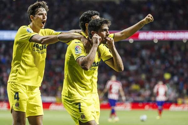 Gerard Moreno celebrates.