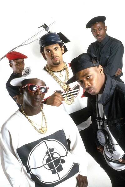 Public Enemy pose for a portrait in a studio