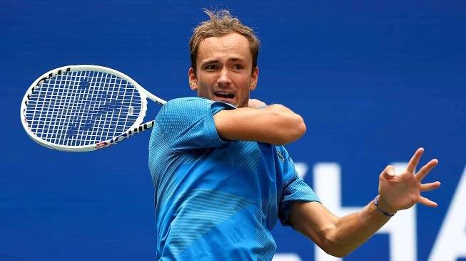 Daniil Medvedev in an Intense Tennis Match Wallpaper