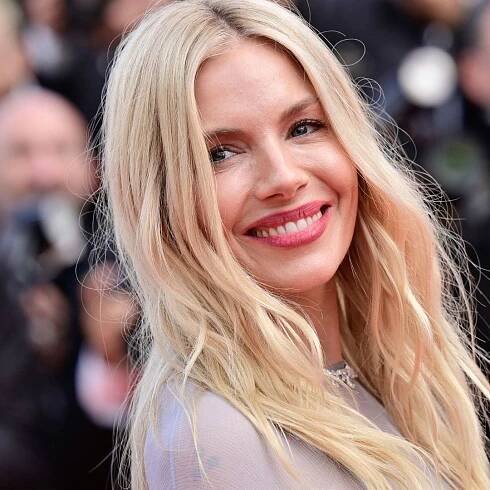 A cami dress is perfect for the heatwave, and Sienna Miller’s style offers a fresh alternative to bright summer...