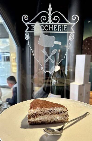 Tiramisu in front of the door to Le Beccherie in Treviso