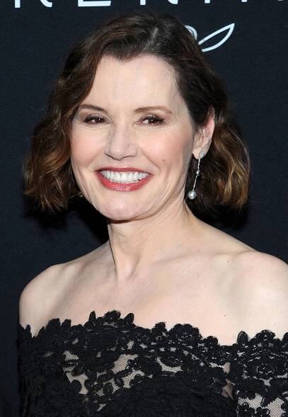 Geena Davis exudes elegance in a black lace off-the-shoulder dress paired with delicate pearl drop earrings at a special screening of Thelma & Louise