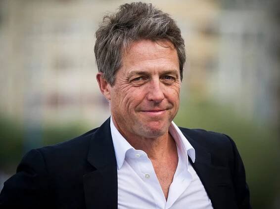 Hugh Grant says movie sets 'are so weird now' because of mobile phones