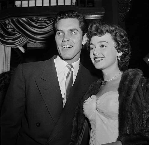 LOS ANGELES,CA - DECEMBER 6,1951: Actress Barbara Rush and husband Jeffrey Hunter attend a movie premiere. 
