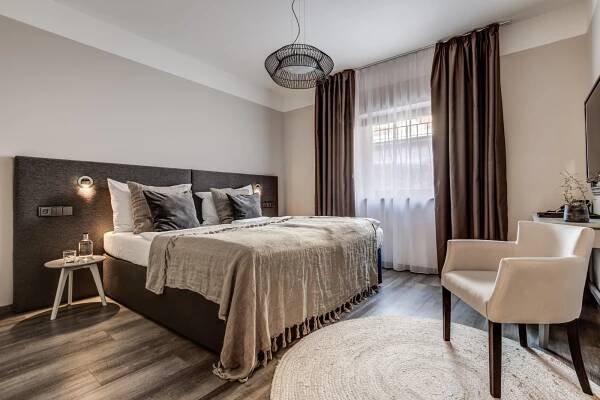 Postel nebo postele na pokoji v ubytování Wellness Hotel Volarik