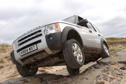 Land Rover Discovery 3 climbing over rocks