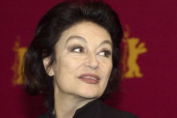 FILE - French actress Anouk Aimee is seen prior to a media conference at the 53rd Berlinale Film Festival in Berlin Thursday, Feb. 13, 2003. Later this evening she will be honored with a Golden Bear award for her lifetime achievements. French actress Anouk Aimée, winner of a Golden Globe for her starring role in "A Man and a Woman" by legendary French director Claude Lelouch, has died, her agent said Tuesday. She was 92. (AP Photo/Sven Kaestner, File)