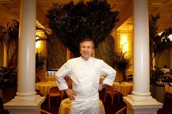 Daniel Boulud in chef jacket at Daniel. 