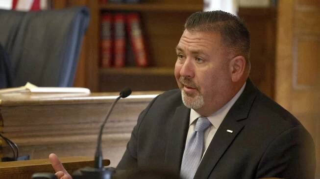 ATF Agent Brian Higgins speaks speaks from the witness stand