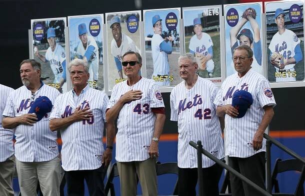 1969 New York Mets players standing for the national anthem.