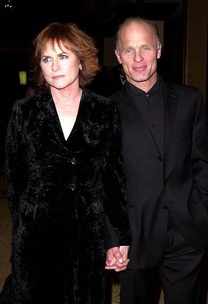 Ed Harris and Amy Madigan at an awards ceremony.