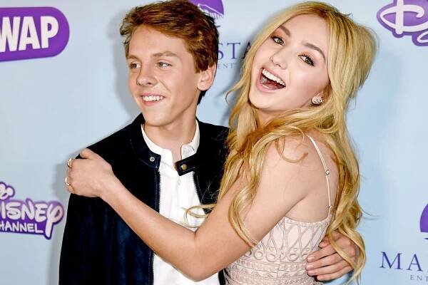 LOS ANGELES, CA - OCTOBER 05: Actors Jacob Bertrand (L) and Peyton List arrive at the premiere screening of Disney Channel's 