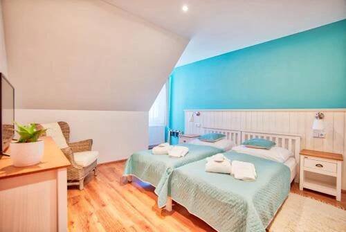 Postel nebo postele na pokoji v ubytování Hotel U Pekaře - Jítravský Dvorec