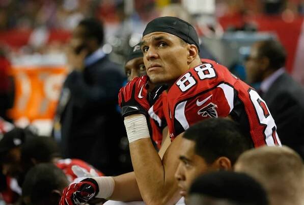 Tony Gonzalez #88 of the Atlanta Falcons sits on the bench