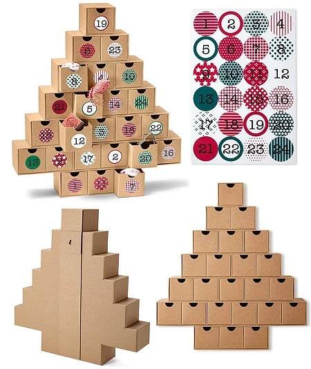 cardboard boxes with numbers and designs on them are stacked in the shape of a christmas tree