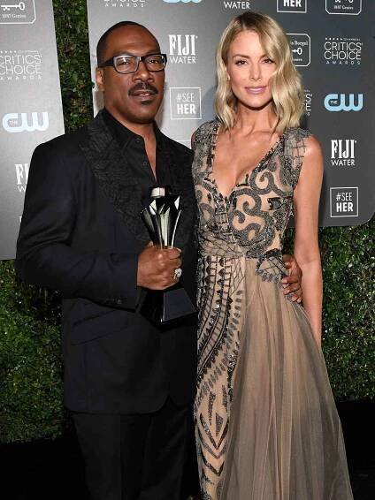 Eddie Murphy and Paige Butcher attend the 25th Annual Critics' Choice Awards at Barker Hangar on January 12, 2020 in Santa Monica, California.