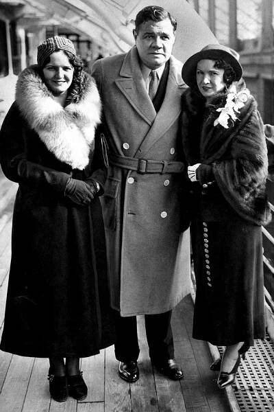 Babe Ruth takes a cruise with his adopted daughter, Julia, and his wife.