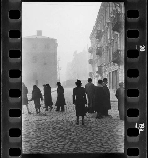 The Warsaw Ghetto Uprising seen from the "Aryan side" at the intersection of Świętojerska and Bonifraterska Streets and Krasiński Square; the ghetto wall is visible.