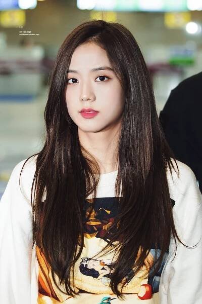 A Girl With Long Hair And A White Shirt