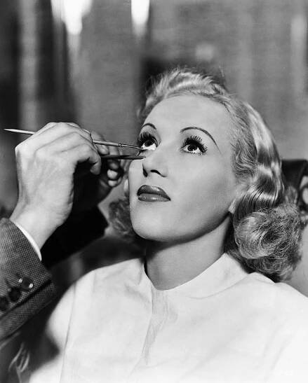 Wally Westmore Applies A Fine White Line Of Greasepaint To Betty Grable'S Lower Eyelid For A Glamorous Hollywood Effect.