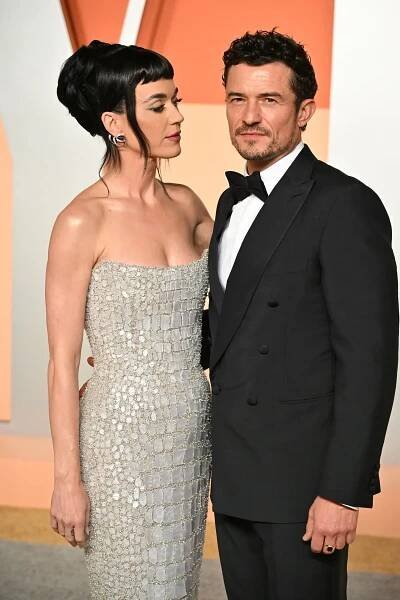 Katy Perry and Orlando Bloom attend the 2025 Vanity Fair Oscar Party Hosted By Radhika Jones