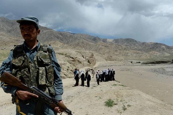 An Afghan policeman stands guard in the Baghlan province.
