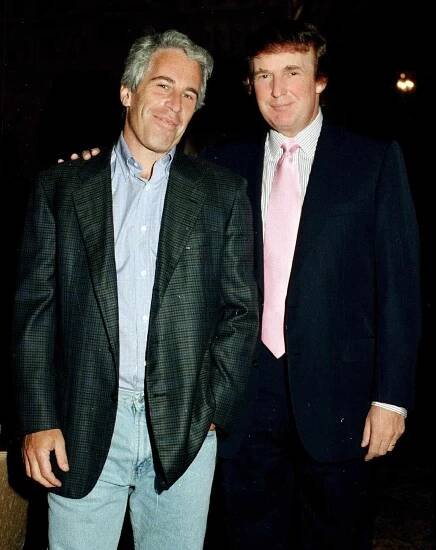 Jeffrey Epstein (left) and real estate developer Donald Trump as they pose together at the Mar-a-Lago estate, Palm Beach, Florida, 1997