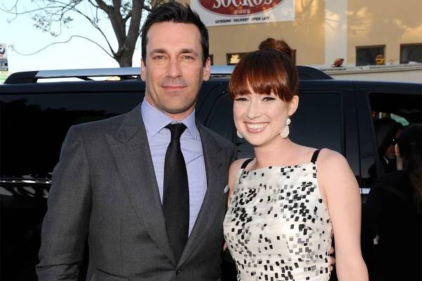 Jon Hamm (L) and Ellie Kemper arrive at the premiere of Universal Pictures' 