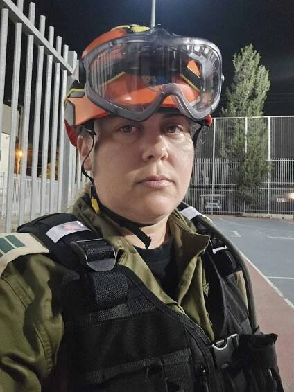 IDF soldier at a missile attack site.
