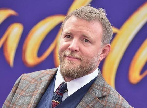 Guy Ritchie, tweeded director of The Ministry Of Ungentlemanly Warfare