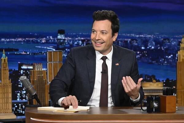 Jimmy Fallon at his desk