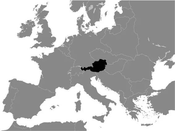 Černá plochá mapa Rakouska (1938) uvnitř šedé mapy Evropy — Ilustrace