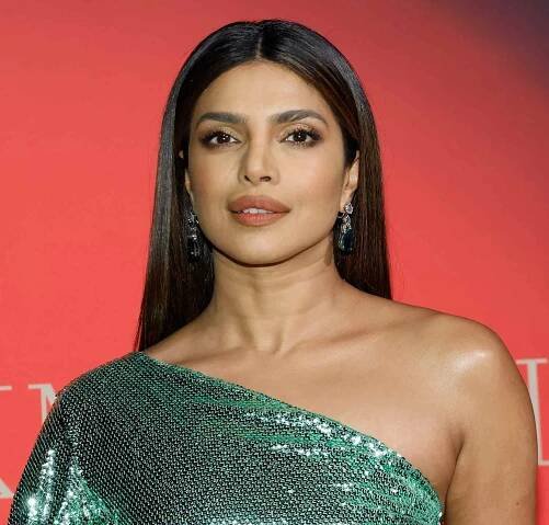 Priyanka Chopra long, straight hair with middle part