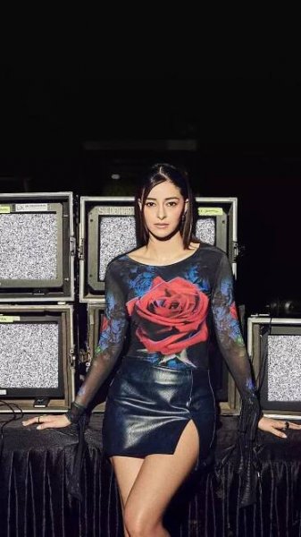 Ananya Panday radiates glitz and glamour in a stunning blackleather skirt and floral top