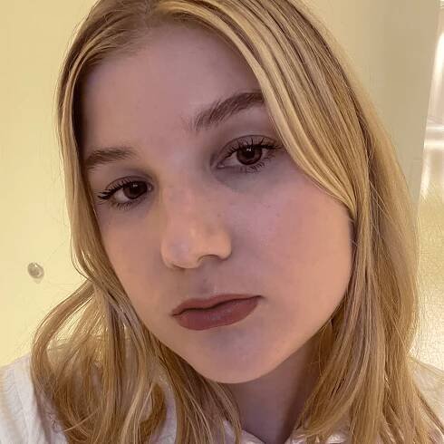 bella wearing the Makeup by Mario satin lipstick