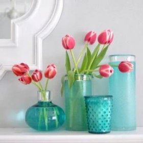 Skleněné vázy (37 fotografií): kulaté výrobky z barevného skla Murano pro domácí dekor, velké průhledné vázy pro květiny