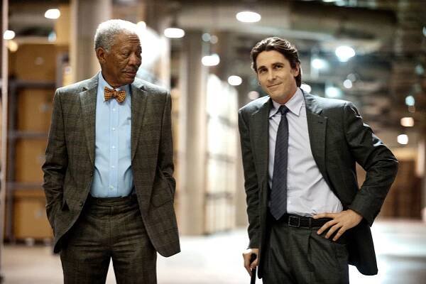 THE DARK KNIGHT RISES, from left: Morgan Freeman, Christian Bale as Bruce Wayne/Batman, 2012. ph: Ro