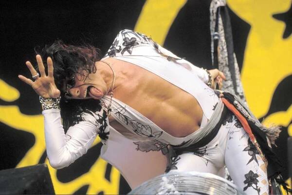 Steven Tyler of Aerosmith performs on stage at Stadion Galgenwaard on 16th August 1990 in Utrecht, Netherlands