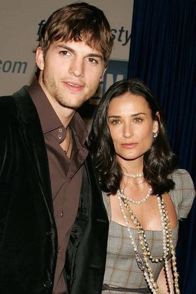 Ashton Kutcher and Demi Moore during 4th Annual "ten" Fashion Show Presented By General Motors at Pavilion in Hollywood in Hollywood, California.